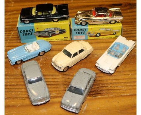 7 Corgi Toys. Chevrolet State Patrol (223). In black with silver flash and yellow interior, labels to doors missing. Boxed. P