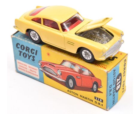 Corgi Toys Aston Martin DB4 (218). A scarce example in yellow with red interior, closed bonnet vent, detailed cast wheels wit