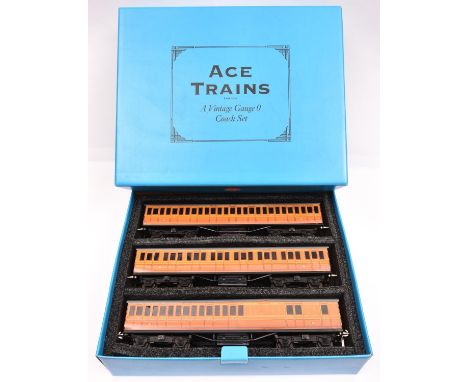An Ace Trains O gauge Metropolitan Railway 3 coach set in lined teak livery. Set comprising 3x compartment coaches; Full Firs
