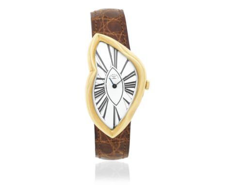 Churchill Watch Co, London. An unusual 18K gold manual wind asymmetric wristwatchDate: Circa 1985Movement: 17-jewel manual wi