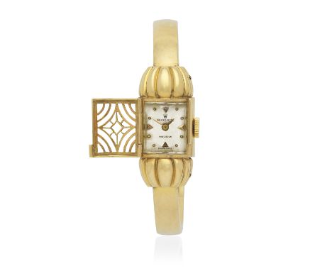 Rolex. A lady's 18K gold manual wind bangle watch with concealed dialModel: PrecisionReference: 8316Date: Circa 1950Movement: