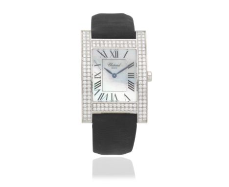 Chopard. A lady's 18K white gold diamond set manual wind wristwatch with mother of pearl dialReference: 17/3451Date: Circa 20