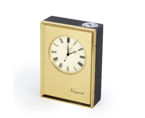 Patek Philippe. A brass and plastic cased quartz desk clock with mahogany presentation boxModel: NaviquartzReference: E1200Da