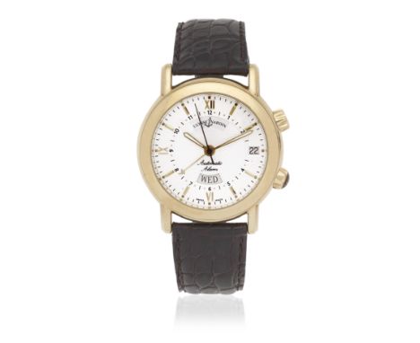 Ulysse Nardin. An 18K gold automatic calendar wristwatch with alarmModel: San MarcoReference: 601-77Date: Circa 2000Movement:
