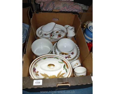 A quantity of Royal Worcester 'Evesham' tableware including flan dishes, gravy boat, casserole, etc.