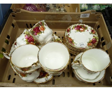 A Royal Albert 'Old Country Roses' part Teaset consisting of six cups and saucers, six side plates, milk jug, bread and butte