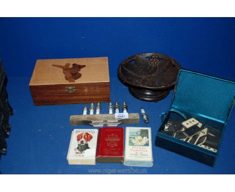 A quantity of miscellanea including wooden musical fruit bowl, wooden box with bear motif, three packs of cards, box of Domin