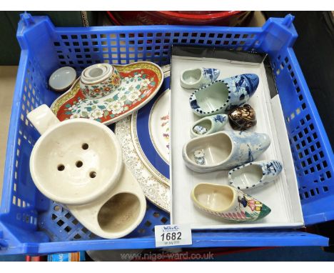A quantity of Delft and Quimper clogs and two miniature frogs, together with two plates, a Wade Shaving mug and pretty floral
