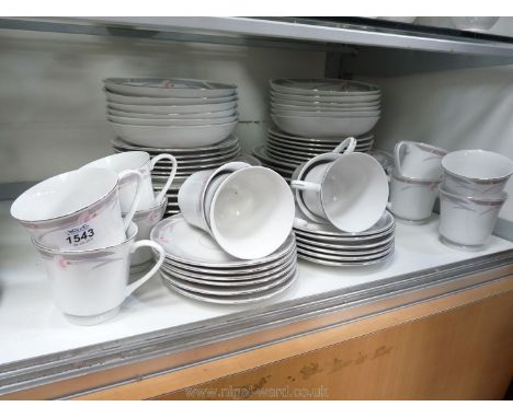 A quantity of Dinner/tea comprising twelve each dinner and side plates, soup/dessert dishes, teacups and saucers, being plain