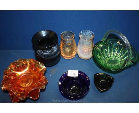 A quantity of coloured glass including Caithness style bud vases, Bristol blue bowl, Carnival etc.