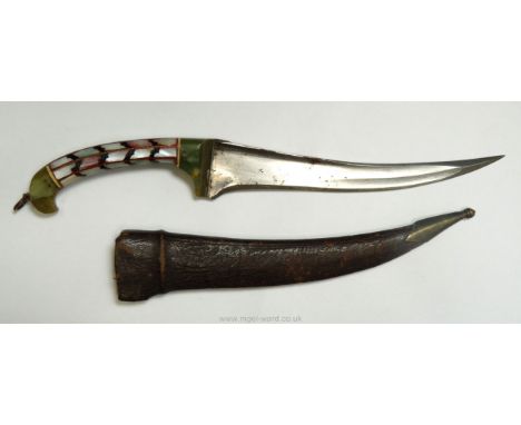 An Oriental dagger with pearl handle.