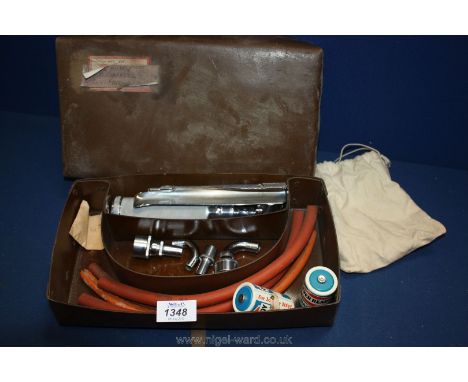 A brown cased vintage Intracheal Inspection set together with various tubes, fittings and two spare bulbs, apparently ex-US A