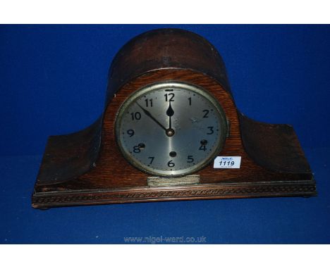 A wooden cased Mantle clock, dedicated to a Mrs F.L. Morris.