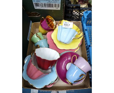 Six Czechoslovakia coffee cups and saucers lined with gilt, each a different colour together with six Royal Stuart by Spencer
