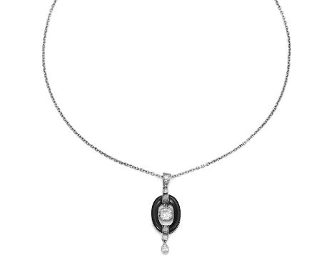 AN ANTIQUE ART DECO DIAMOND AND ENAMEL PENDANT in white gold or platinum set with a central transitional cut diamond of 0.50 