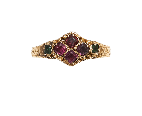 AN ANTIQUE GARNET AND EMERALD RING, CIRCA 1870 in 15 carat yellow gold, set with a quatrefoil motif of cushion cut garnets fl