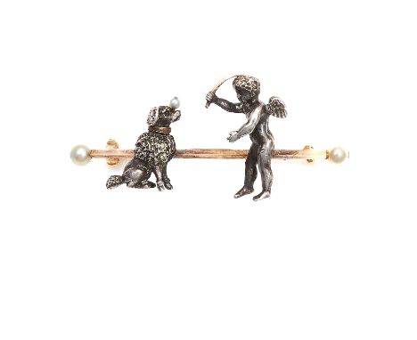 AN ANTIQUE PEARL CHERUB AND DOG BROOCH in high carat yellow gold, depicting a winged cherub and seated dog with a pearl atop 