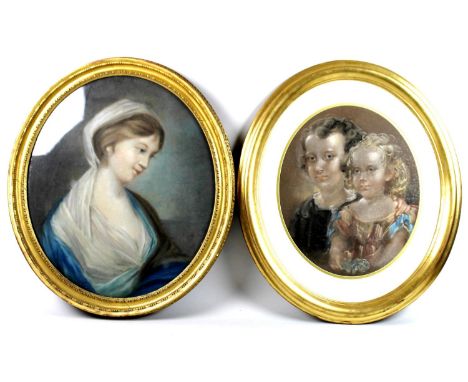 A 19th century pastel portrait of a lady, 58cm oval, together with another pastel portrait of two young children, 44cm oval, 