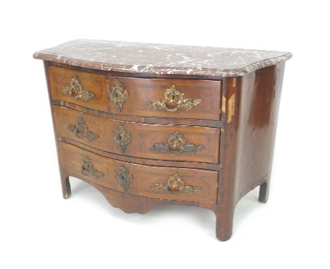 A French Louis XVI commode, late 18th century, with bow front and sides, rouge griotte marble surface with moulded edges, two