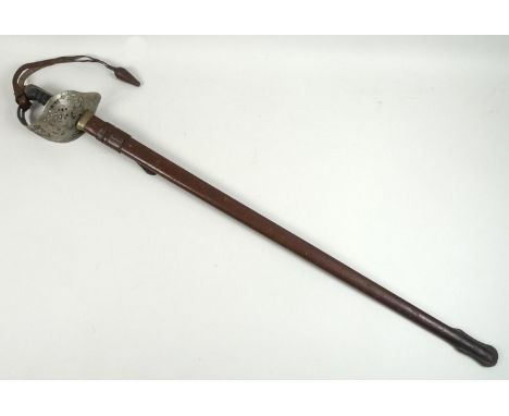 An early 20th century Officers' sword with leather scabbard, with GR monogram to the pierced guard, wired shagreen grip, spin