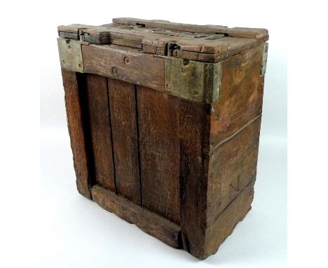 A WWI oak crate salvaged from the southern English coast, with unusual brass locking top, broad arrow marking and stamped 191