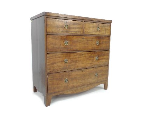 A Regency mahogany chest of two over three drawers, flat fronted, brass ring handles, raised on bracket feet, 97 by 49 by 99c