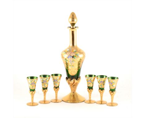 A Murano green glass and gilt overlaid liqueur set, including a decanter, 36cm, and six glasses.