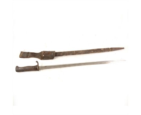 A German World War I period bayonet, 52cm blade, with scabbard and leather frog.