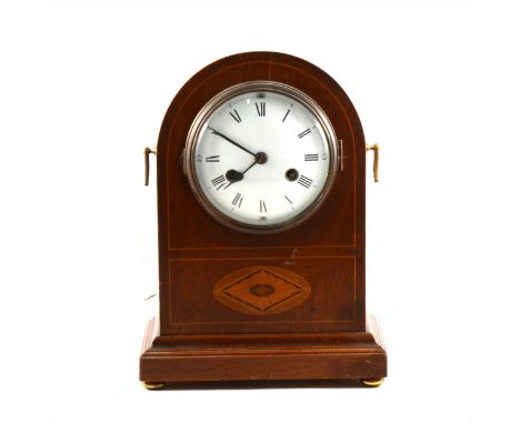 An Edwardian inlaid mahogany mantel clock, white enamelled dial, movement marked PHS, striking on a single gong, 34cm.