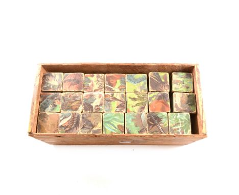 A set of puzzle blocks, one side depicting Generals of the British Army, battle scenes on other sides.