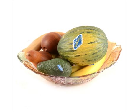 A moulded glass fruit bowl, a collection of Penkridge ceramic fruit and wooden fruit.