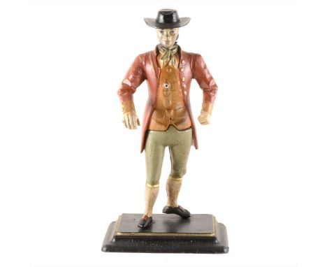 A painted cast metal clock figure, 40cm; and a carved walnut aneroid wall barometer. (Qty: 2)