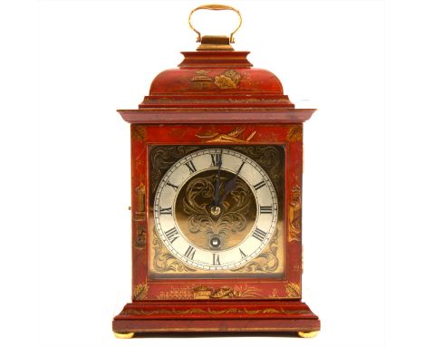 A red lacquered and chinoiserie decorated mantel clock, brass dial with silvered chapter ring, signed J. C. Vickery, London, 