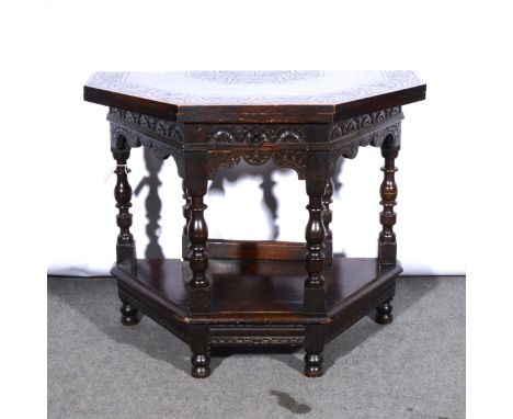 Oak credence table, adapted, octagonal foldover top with carved lunettes, turned gate legs, width 92cm.