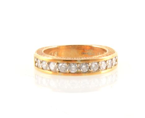 A diamond half eternity ring, ten round diamonds claw set in an 18 carat yellow gold mount, width at front 5.6mm, approximate