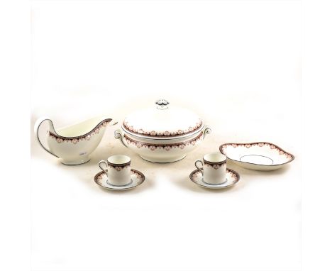A Wedgwood bone china eight-place dinner service, Medici pattern, including tureens and sauceboat, together with coffee ware.