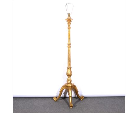 A gilt wood standard lamp, fluted and leaf-cap column, scrolled tripod legs, 145cm.