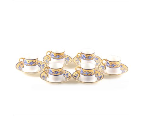 A set of six Shelley bone china coffee cans and saucers, 'Blue Swallows' pattern, blue and gilt decoration.