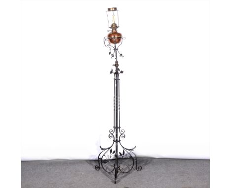 A Victorian cast metal standard lamp, copper reservoir, adapted for electricity, height 156cm.