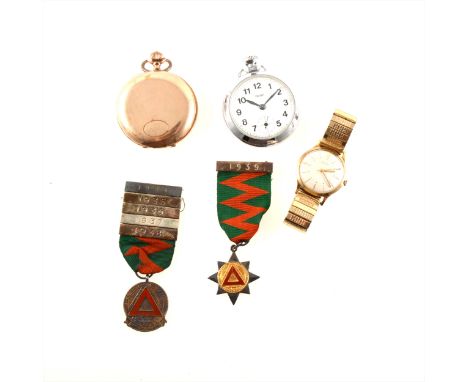 Two pocket watches and a wrist watch, two silver medallions, a gentleman's gold coloured Avia wrist watch with engraved prese