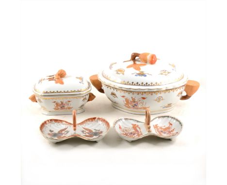 A modern Chinese armorial table service, some pieces featuring the Royal Arms, including tureens, sauce tureens, meat plates,