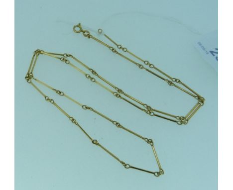 An 18ct yellow gold Chain, formed of alternate long bar links joined with circular links at each end, 9.4g.