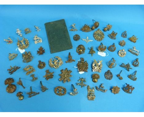 A Collection of brass British Army Cap Badges, including Royal Scots Greys, 3rd King's Own Hussars, 9th Queen's Royal Lancers