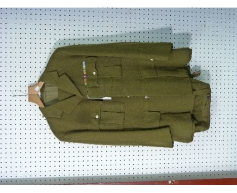 A Vintage British Army RAOC No.2 Dress Uniform, with Korea and WW2 medal ribbons, collar dogs missing.