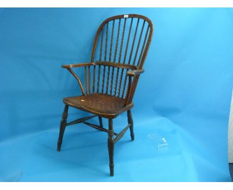 A 19thC ash and elm Double Bow Back Windsor Chair, with stick back and saddle seat supported on turned legs untied by an H-st