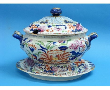 A 19th century Ironstone China Tureen with Cover and Stand, of two-handled oval form with flower-head finial, decorated in co