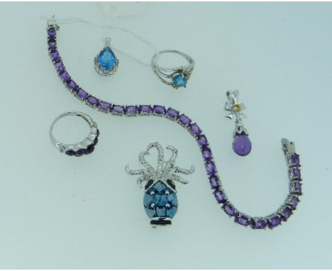 A small collection of Gems TV Jewellery, including a 14k white gold ring, set five graduated facetted amethyst coloured stone