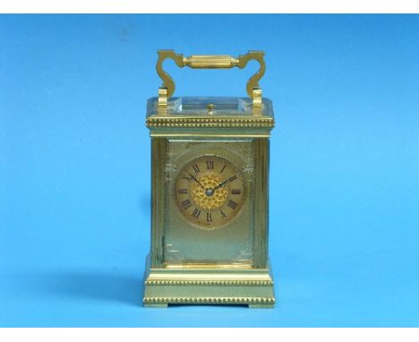 A French gilt-brass repeating Carriage Clock, of five-glass form with architectural case, gilt dial and black Roman numerals,