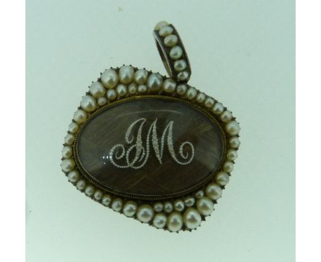 A Memento Mori, of rectangular form with seed pearl border, the oval centre set with plaited hair and tiny seed pearl initial