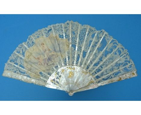 A 19thC Brussels Lace Fan, with sixteen Mother-of-Pearl sticks and two guard sticks, intricately carved in light relief and p